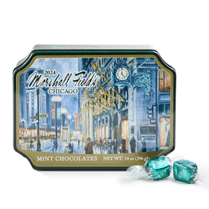Marshall Field's 2024 Mint Chocolates in a decorative tin featuring a vintage Chicago scene, net weight 14 oz (396 g).