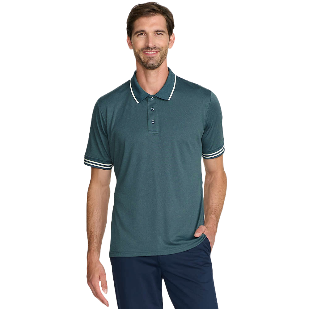 A men's short-sleeve Birdseye Performance Polo in teal, featuring a three-button placket, contrast trim on the collar and cuffs, and a relaxed fit, paired with dark pants.