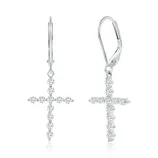 Silver earrings with dangling cross pendants, each adorned with small, sparkling stones.