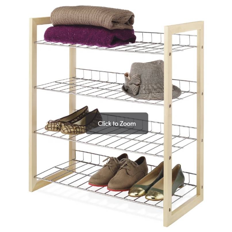 A wooden and wire shelving unit holds folded clothing, a hat, and three pairs of shoes.