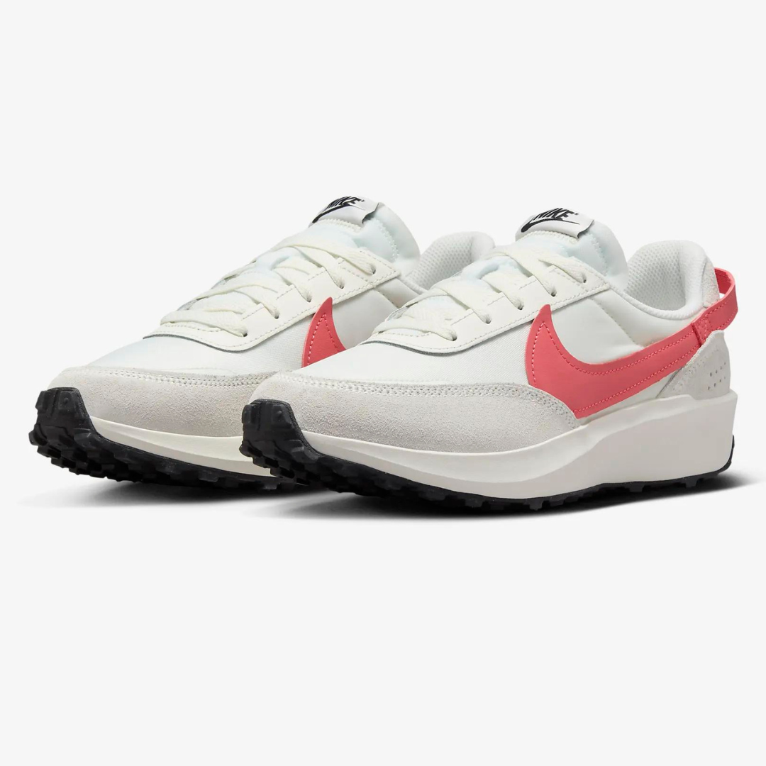White Nike Waffle Debut Shoes with red swoosh logos, black outsoles, and light gray accents on the upper.