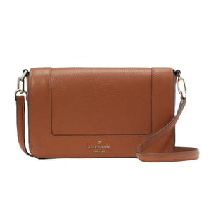 A brown Kate Spade leather crossbody bag featuring a sleek design with a flap closure, detachable strap, and the brand's logo on the front.