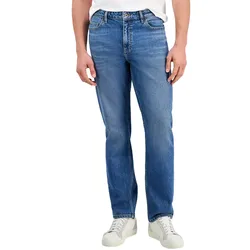 A person is wearing blue straight-leg jeans paired with white sneakers.