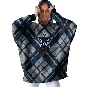 A person wears a plaid-patterned wearable blanket hoodie featuring a navy blue star logo on the front.
