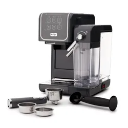 Espresso machine with a milk frother and removable water tank, accompanied by a portafilter, tamper, and interchangeable filter baskets.