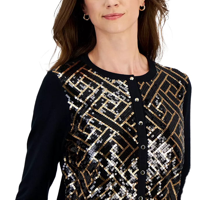A black long-sleeve cardigan featuring a geometric sequin pattern in gold and silver with a button-down front.
