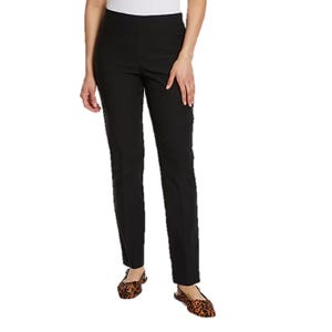 Black Gloria Vanderbilt women's trousers with a straight-leg design and a seamless waistband, paired with leopard print flats.