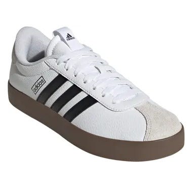 White sneakers with black stripes on the side, a beige suede toe cap, and a dark brown rubber sole, featuring the Adidas logo on the tongue and heel tab.