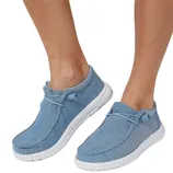 Casual slip-on shoes in light blue with white soles and a simple lace design, suitable for everyday wear.