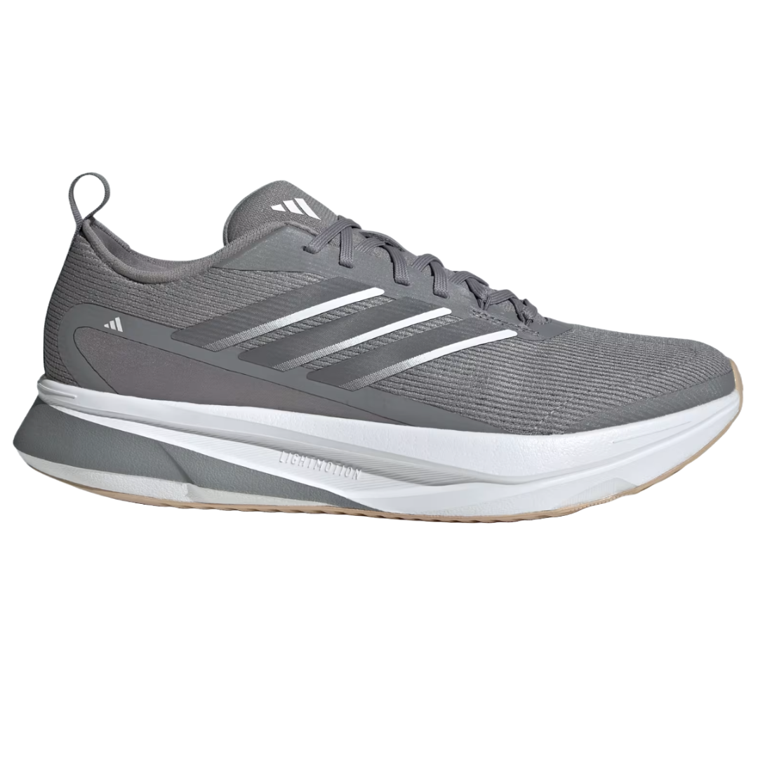 Gray Adidas Jogit Running Shoes featuring a lightweight design, Lightmotion cushioning, and white accents on the sides for enhanced comfort and style.