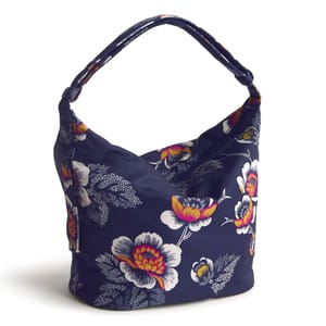 A navy blue floral-patterned hobo bag with a wide strap and a spacious shape, featuring vibrant yellow and pink flowers.