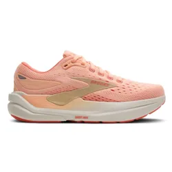 A peach-colored athletic shoe with perforated uppers, cushioned sole, and labeled \“Ghost Max.\“