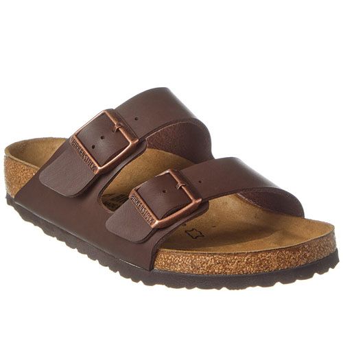 A brown Arizona Birko-Flor sandal featuring two adjustable buckled straps and a contoured cork footbed for comfort.