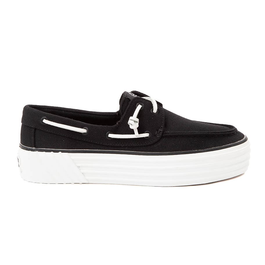 Black and white platform boat shoe with laces.