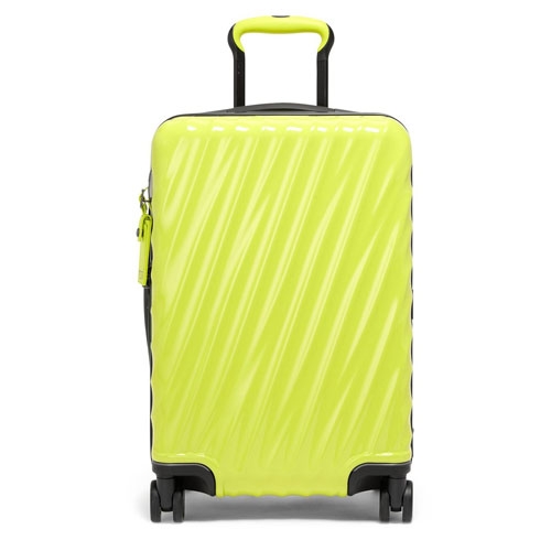 Neon yellow hard shell suitcase with a ridged texture and retractable handle.