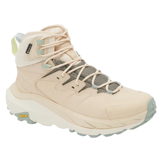 Hoka Kaha 2 GTX Waterproof Hiking Boots in beige feature a high ankle design with Gore-Tex technology, mesh accents for breathability, and a cushioned Vibram sole for traction and comfort.