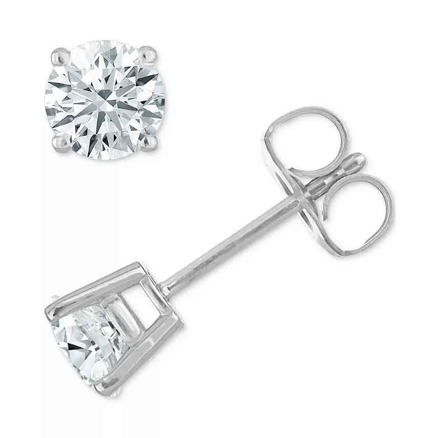 A pair of 1/2ct round diamond stud earrings set in four-prong white metal settings with butterfly backings.