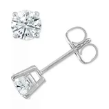 A pair of 1/2ct round diamond stud earrings set in four-prong white metal settings with butterfly backings.