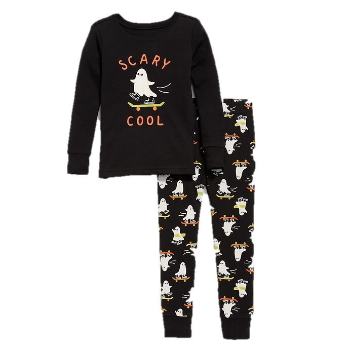 A black pajama set featuring a long-sleeve top with \“Scary Cool\“ text and a ghost on a skateboard, paired with matching pants covered in the same ghost design.