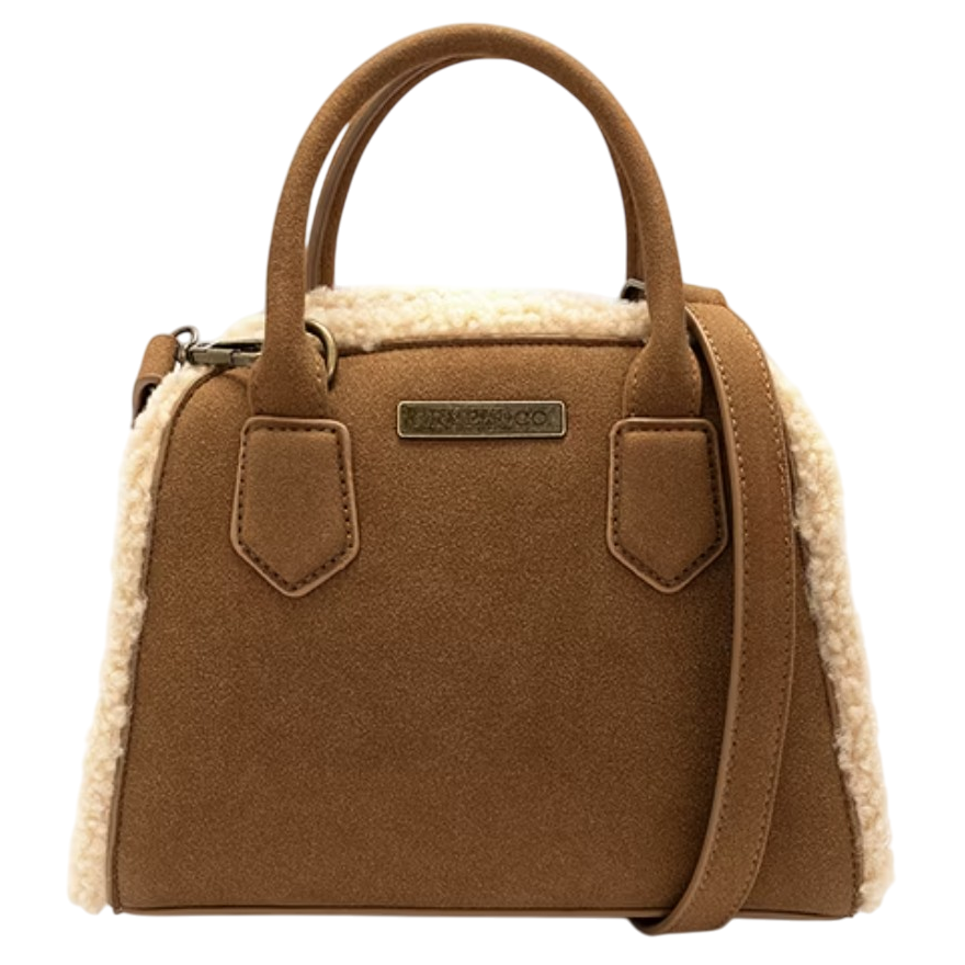 A brown handbag with a soft, plush texture and shearling trim features two handles, a shoulder strap, and a front logo plaque.