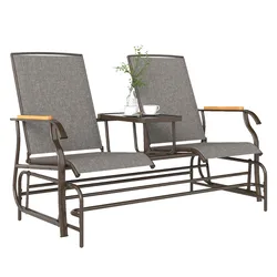 A two-seater outdoor glider bench with a middle table, featuring a metal frame, gray fabric seats, and wooden armrest accents.