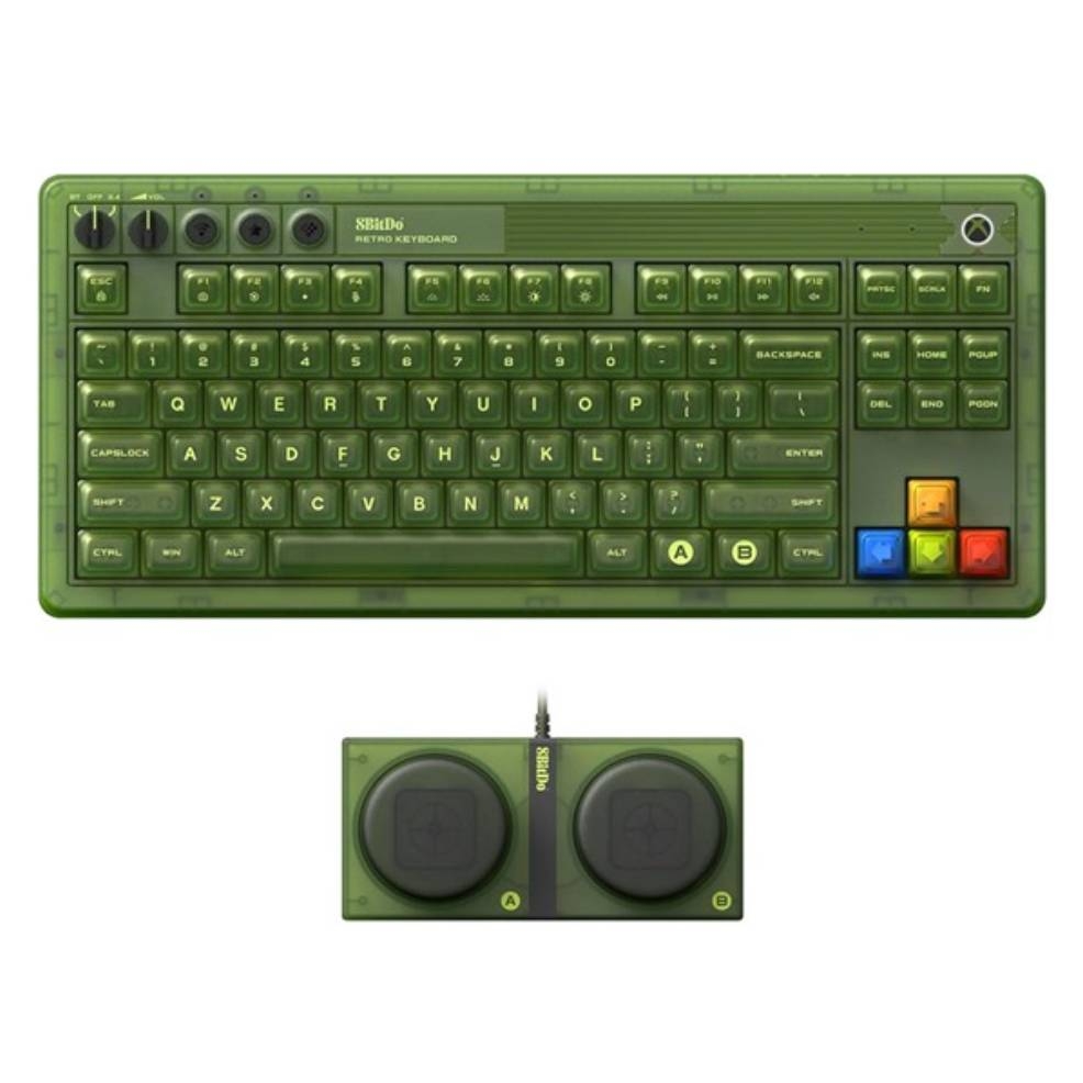 A retro-style green keyboard with colorful keys and a matching controller featuring two large buttons.