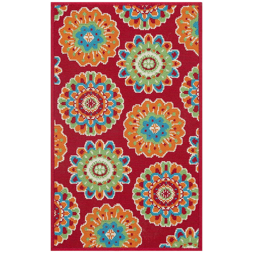 Colorful medallion-patterned rug featuring vibrant hues of red, orange, blue, and green on a red background. Suitable for indoor and outdoor use.