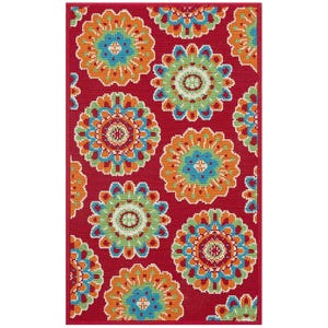 Colorful medallion-patterned rug featuring vibrant hues of red, orange, blue, and green on a red background. Suitable for indoor and outdoor use.