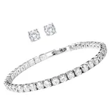 A silver bracelet with clear stones arranged in a row and a pair of matching stud earrings, each featuring a clear stone.