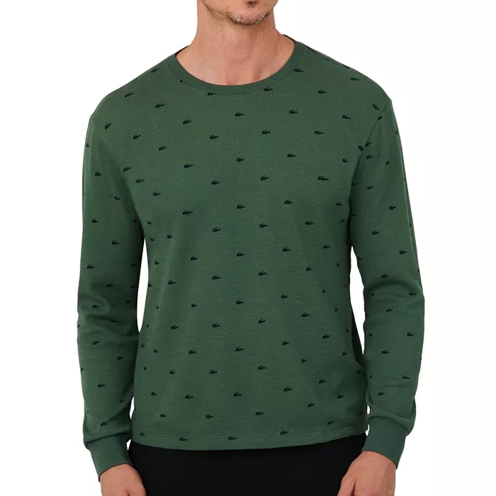 A green long-sleeve sweater with a crew neck, featuring a repeating pattern of small logos.