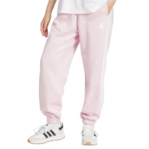 Pink Adidas sweatpants with white side stripes, paired with white Adidas sneakers featuring black stripes and tan soles.