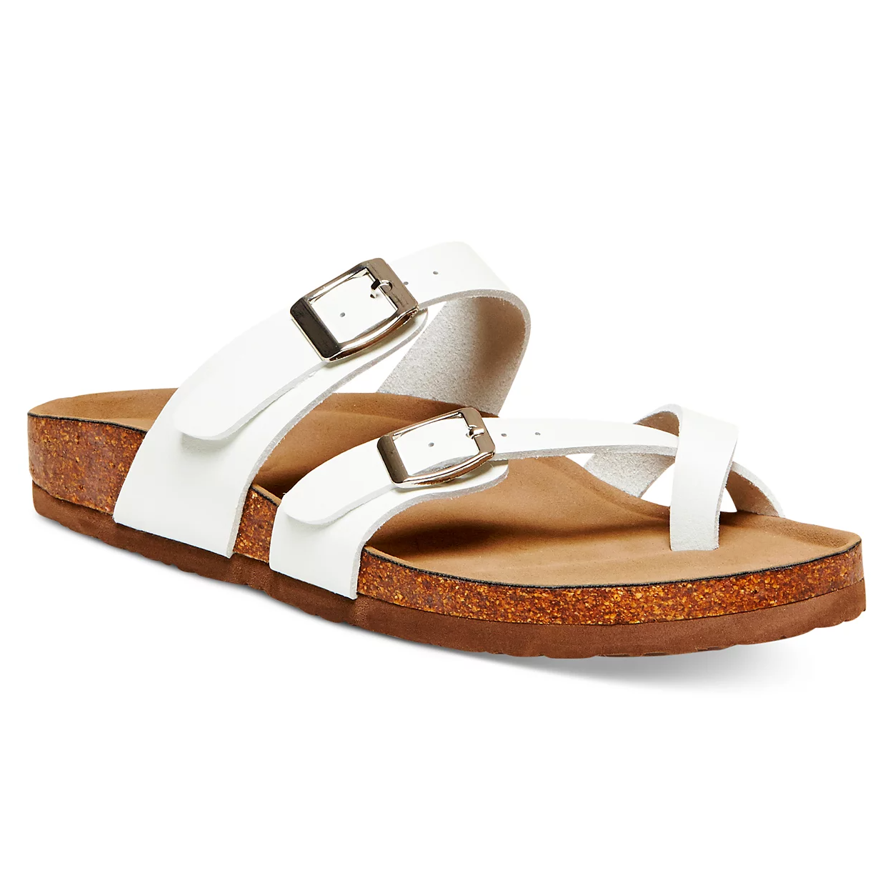 White footbed sandals with a cross strap design and two adjustable metal buckles, featuring a cork-effect sole and cushioned, tan footbed for comfort.