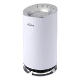 A white cylindrical air purifier with a sleek design, featuring control buttons on top and a vented base.