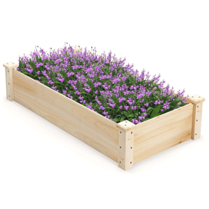 Wooden raised garden bed filled with blooming purple flowers, featuring a natural finish and sturdy corner posts.