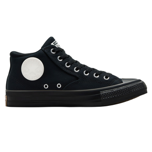 Black high-top sneaker with white circular logo, featuring metal eyelets and black rubber toe cap and sole.