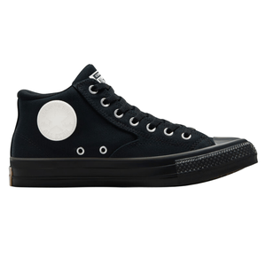 Black high-top sneaker with white circular logo, featuring metal eyelets and black rubber toe cap and sole.