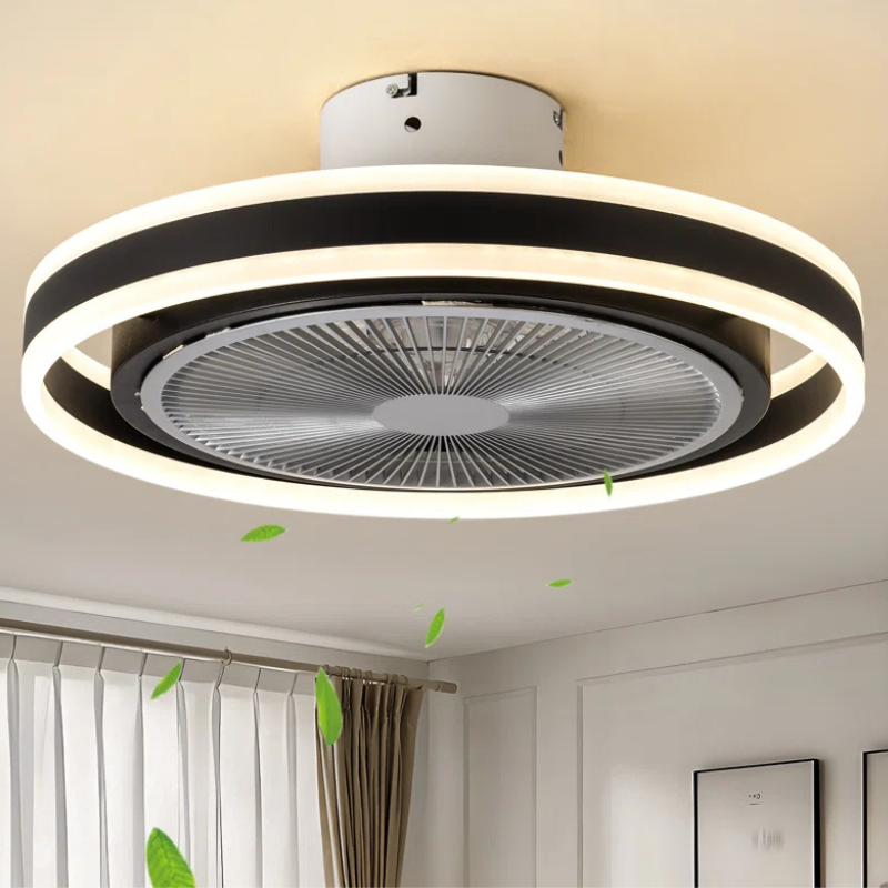 A modern ceiling fan with integrated LED lighting, featuring a circular design and emitting a soft glow. It has a sleek, minimalistic look, suitable for contemporary interiors.