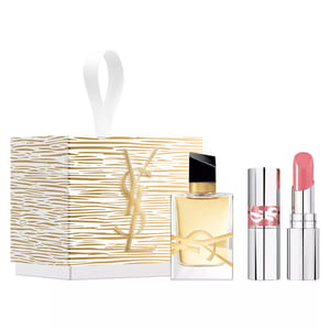 YSL gift set featuring a perfume bottle and a pink lipstick, presented with a decorative box adorned with gold accents.