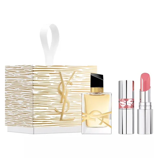 YSL gift set featuring a perfume bottle and a pink lipstick, presented with a decorative box adorned with gold accents.