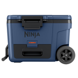 A blue Ninja outdoor cooler with wheels, a handle, and secure latches.