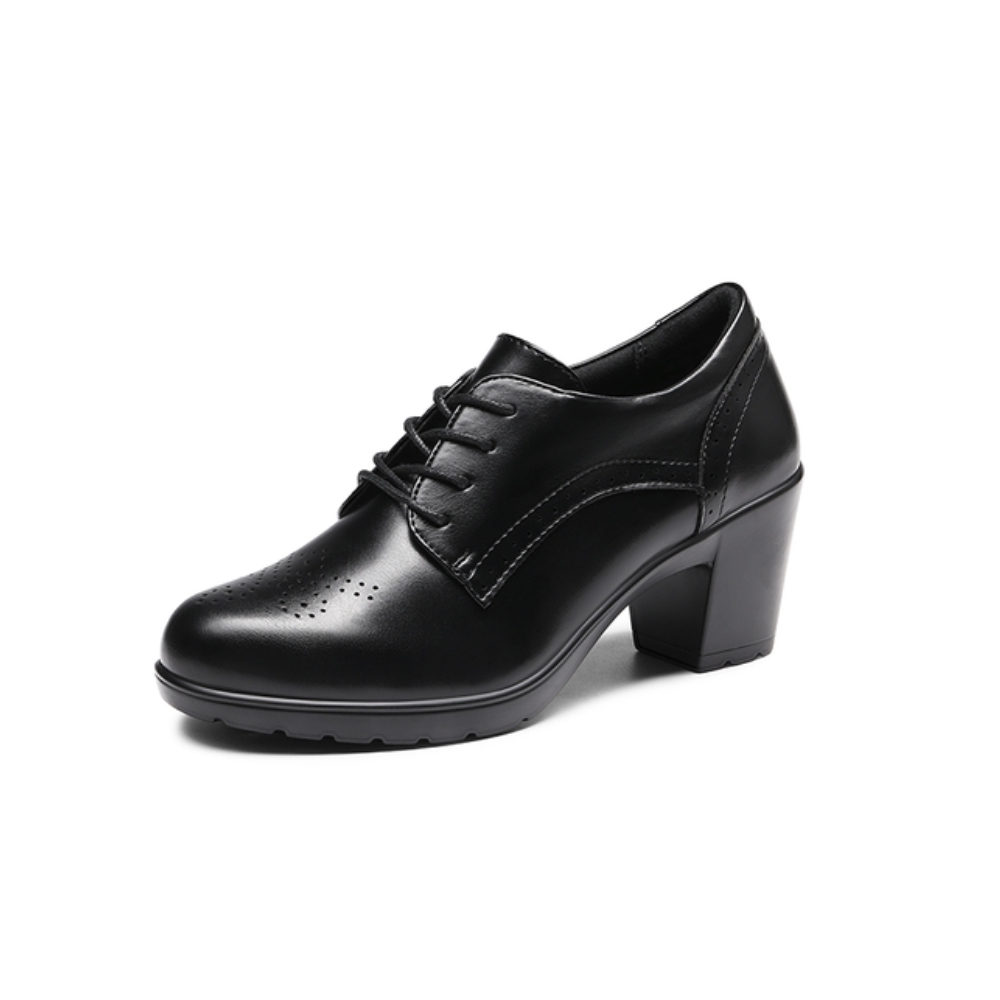 Black lace-up heeled shoe with a perforated design on the toe.