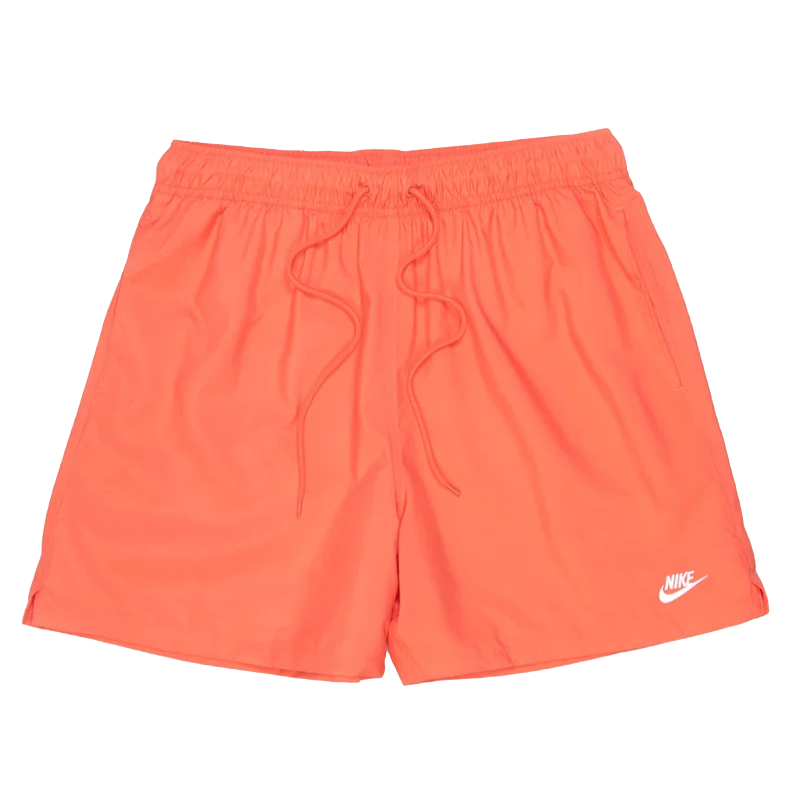 Bright orange Nike shorts with an elastic waistband and drawstrings, featuring the Nike logo in white on the lower left.