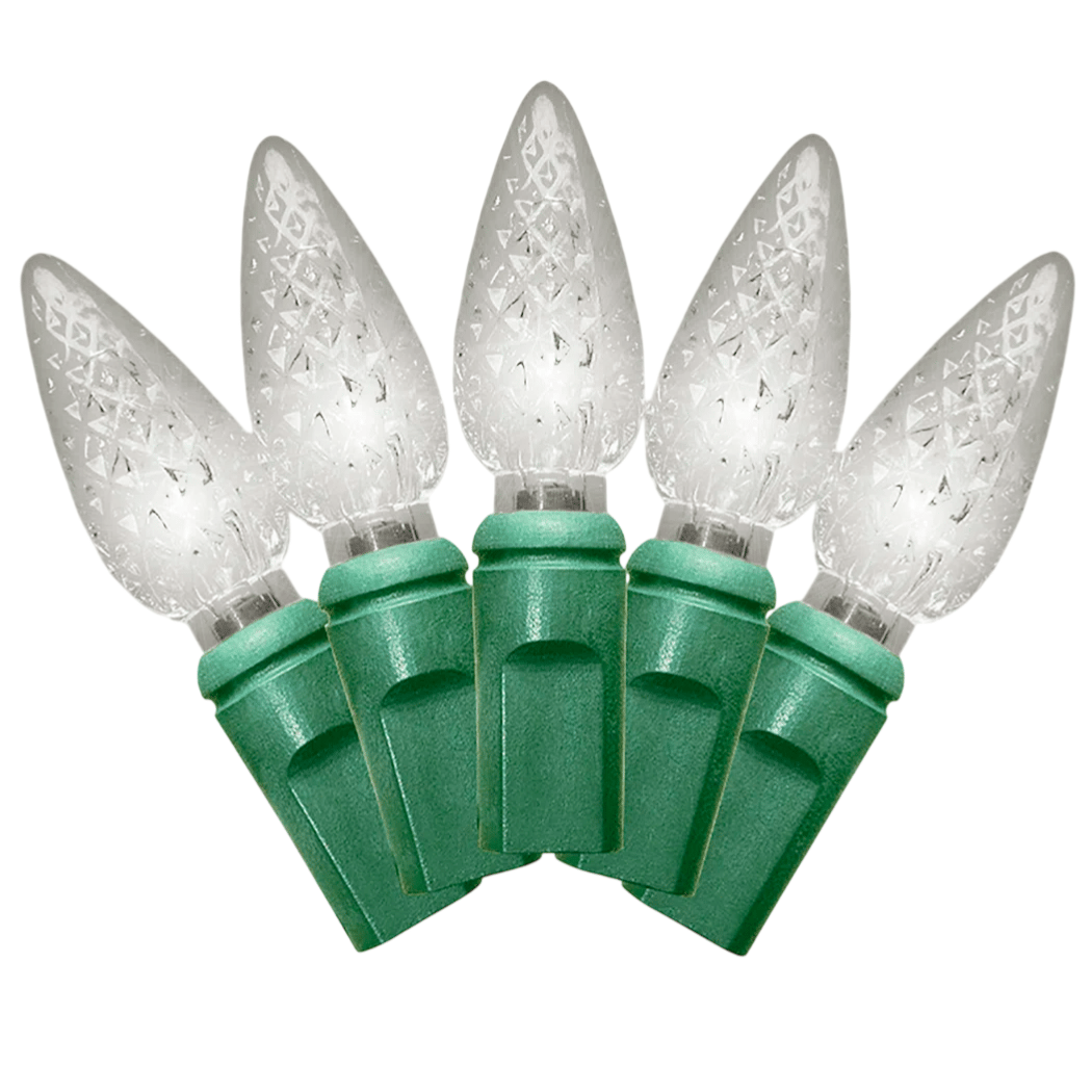 LED Christmas lights with clear, textured C6 bulbs and green sockets, arranged in a fan shape.