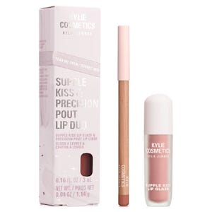 Kylie Cosmetics Supple Kiss & Precision Pout Lip Duo includes a lip glaze (3 mL) and a lip liner (1.14 g/0.04 oz) in a light pink and nude color scheme, packaged in a pale pink box.