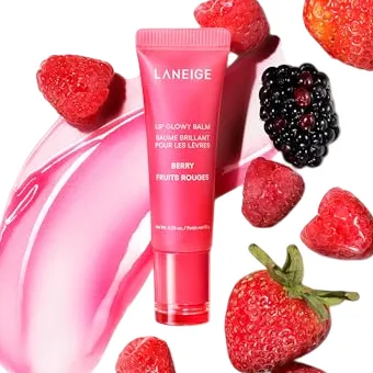 Laneige Glowy Lip Balm in a red tube, Berry flavor, surrounded by glossy depictions of strawberries and blackberries.