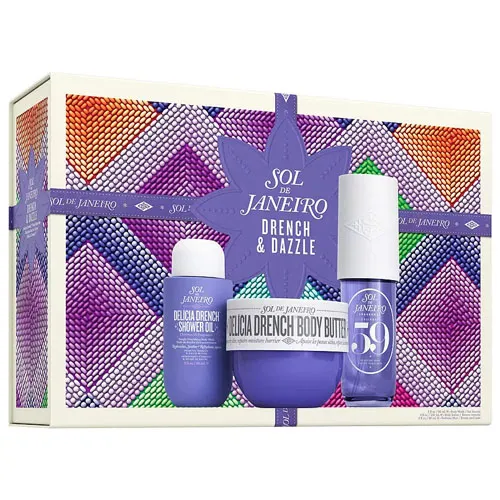 Sol de Janeiro Drench & Dazzle set includes Delicia Drench Shower Oil, Delicia Drench Body Butter, and a spray labeled \“68.\“ The packaging features vibrant purple and multicolored beadwork design.