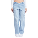 Light blue high-waisted straight-leg jeans paired with white sneakers, worn with a white long-sleeve crop top.