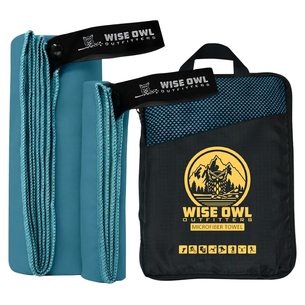 Two teal microfiber quick-dry towels with hanging loops, labeled \“Wise Owl Outfitters,\“ accompanied by a black carrying pouch featuring a yellow logo of an owl in front of mountains.