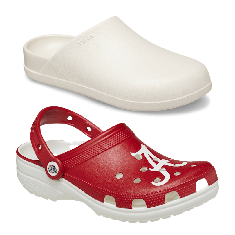 Two pairs of casual footwear by Crocs: a white slide-on and a red clog with a sports team emblem.