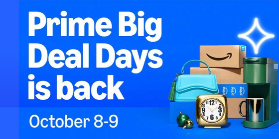 White text on a blue background displaying the words "Prime Big Deal Days are Back October 8th through 9th" alongside an Amazon box, a clock, two green and gold holiday ornaments, and a green Keurig coffee maker.